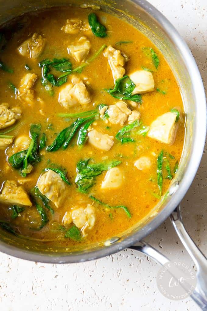 Simple Thai Yellow Curry in a pan with chicken.