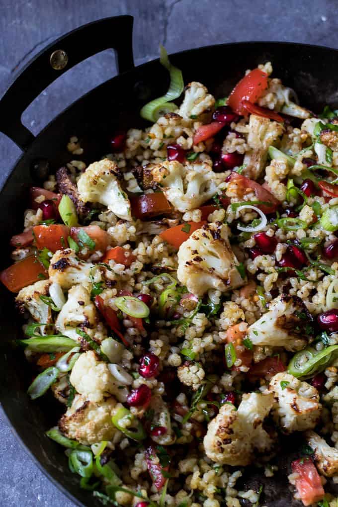 Roasted Cauliflower Tabbouleh with tomatoes.