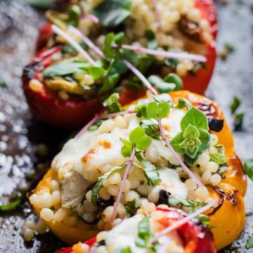 Veggie stuffed bell peppers with cheese.