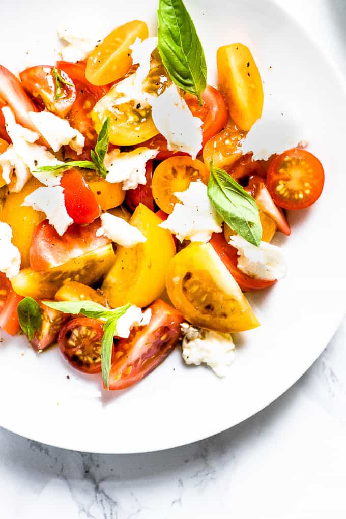 4 ingredients, 4 salads and all the juicy, sweet tomato perfection you can handle.