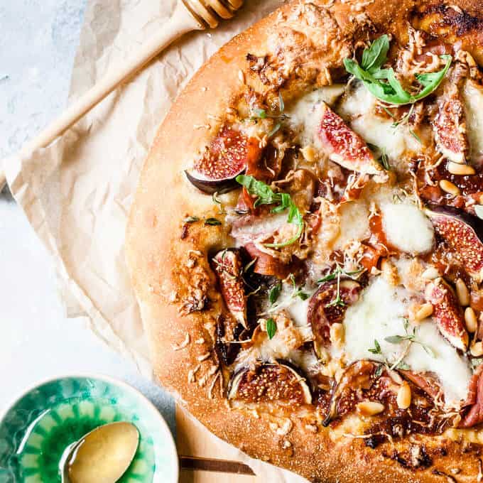 This fig and prosciutto pizza is the perfect dinner lifesaver. Ditch the pepperoni and jazz up pizza night with onion marmalade, juicy ripe figs and creamy salty prosciutto.
