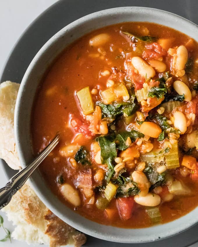 Hearty white bean minestrone is a veggie loaded warming spin on the Italian classic. This soup is full of veggies and protein to keep winter colds at bay and it's got a depth of flavour from pancetta and cavolo nero. A nod to classic Italian ingredients. 