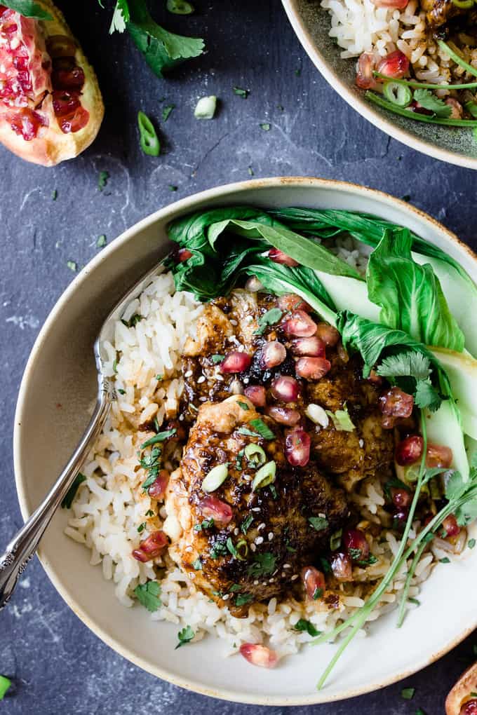 This sticky Asian pomegranate chicken is the perfect one pot meal. It's a delicious balance of sticky sweet ginger garlic sauce and tart pomegranate molasses. It's a one pot 30 minute dinner that will be a new family favourite.