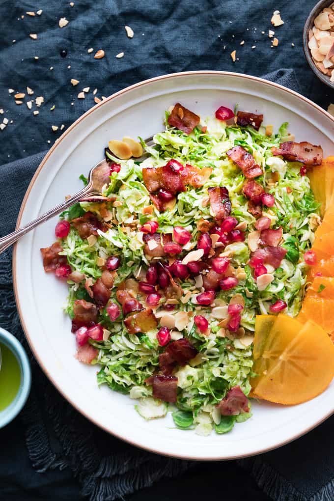 It's delicate shaved sprouts, warm and crispy bacon and bright citrus vinaigrette with toasted almonds.