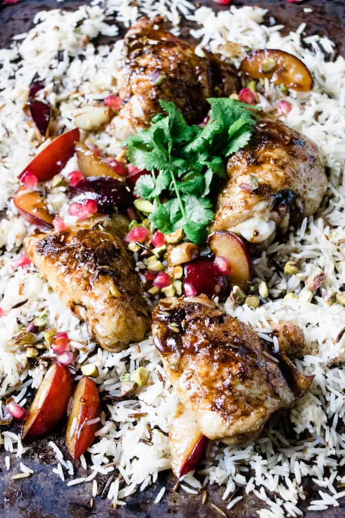 This chicken and pomegranate chicken sheet pan dinner is the perfect sweet and sour chicken with a twist. Low fat and simple to make in 30 minutes.