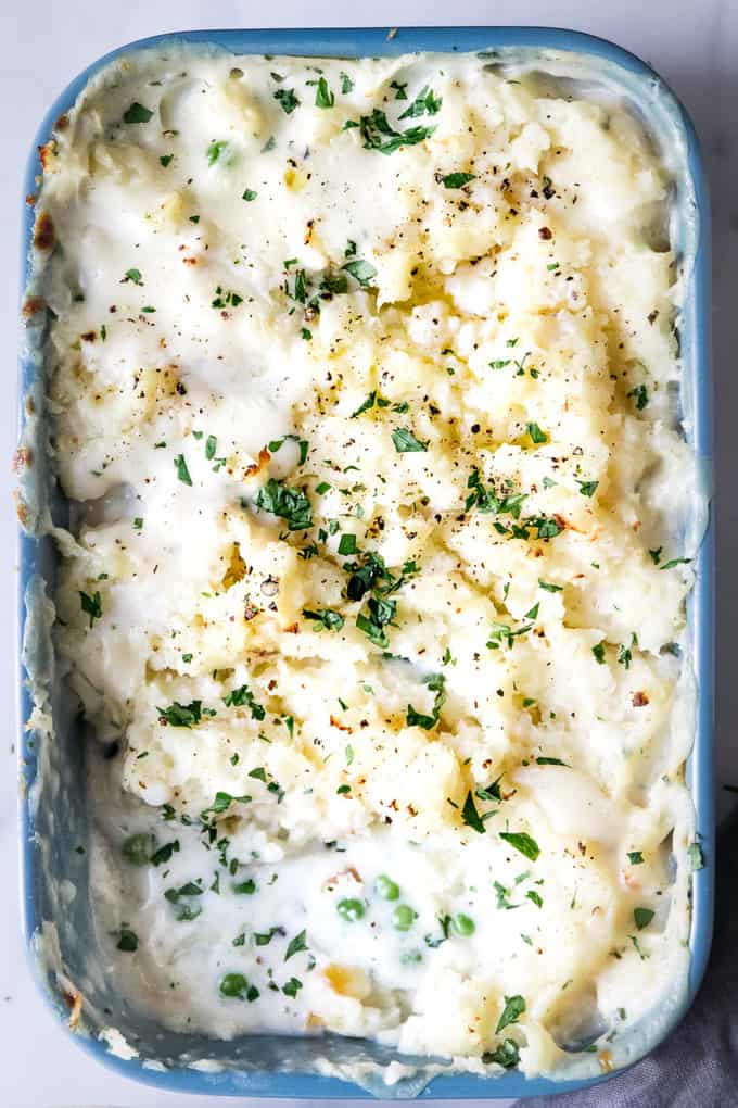 A simple celeriac topped fish pie recipe that’s super cozy and quick and easy to prepare. It's perfect to be portioned into ramekins and frozen for quick toddler meals or cook in a big dish for the perfect family supper.