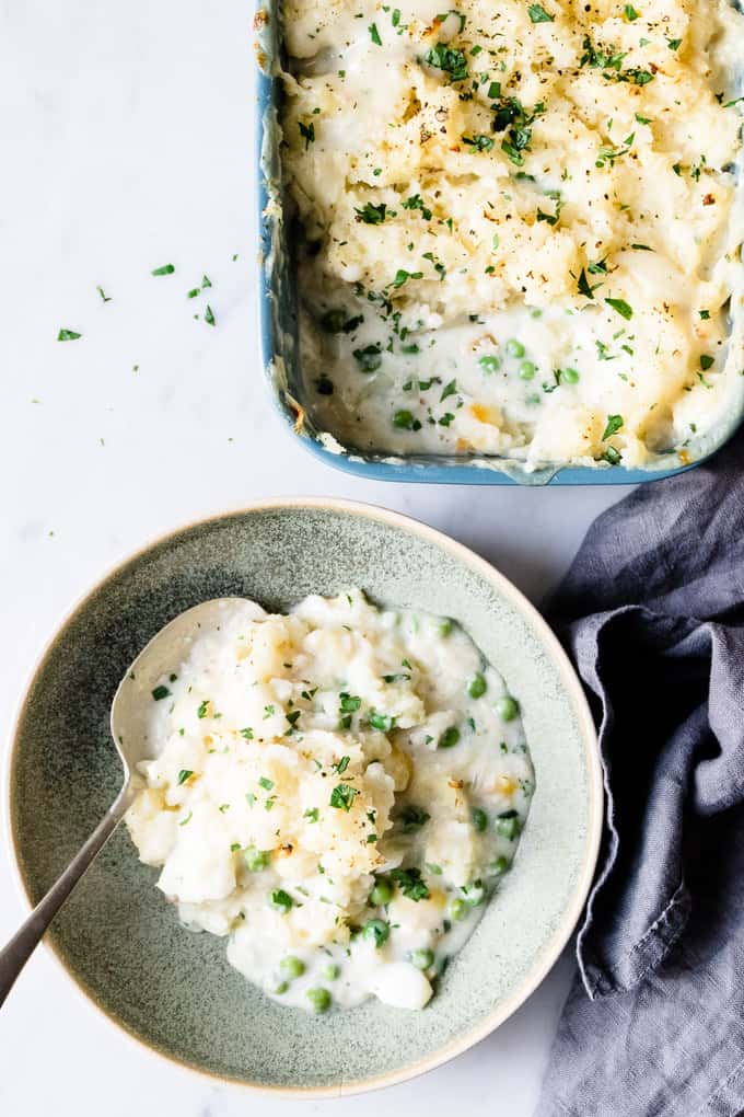 A simple celeriac topped fish pie recipe that’s super cozy and quick and easy to prepare. It's perfect to be portioned into ramekins and frozen for quick toddler meals or cook in a big dish for the perfect family supper.