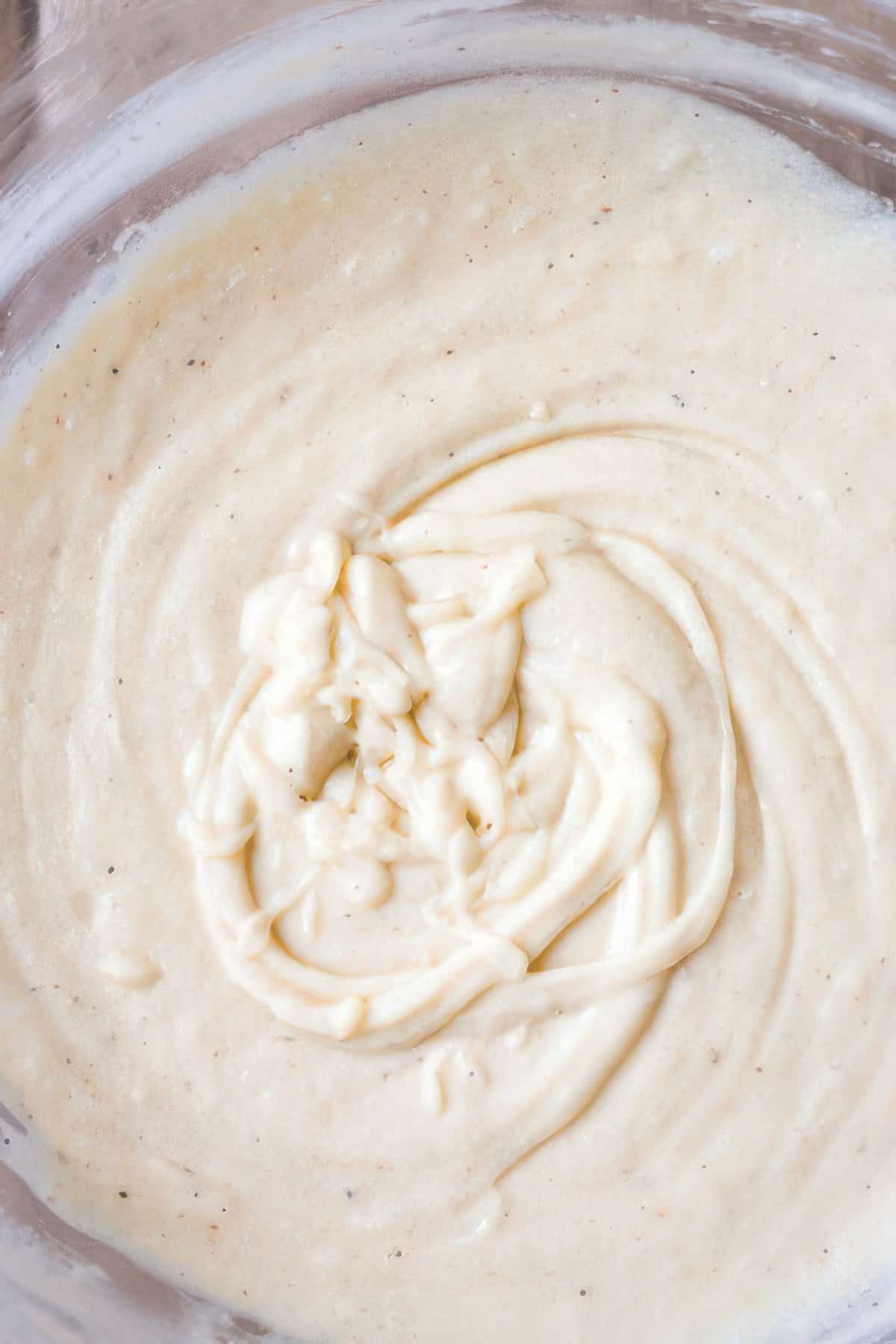 Butter pecan cake batter in a mixing bowl.