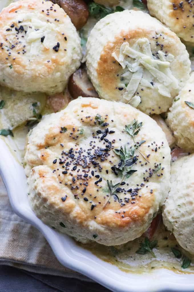 This turkey and mushroom pie with herb biscuit topping is the cosiest way to use up leftover turkey. The simple biscuit topping elevates this pie to a luxurious dinner. Perfect for cosy and casual entertaining.