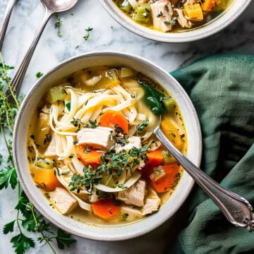 Easy homemade turkey noodle soup in a bowl with vegetables.