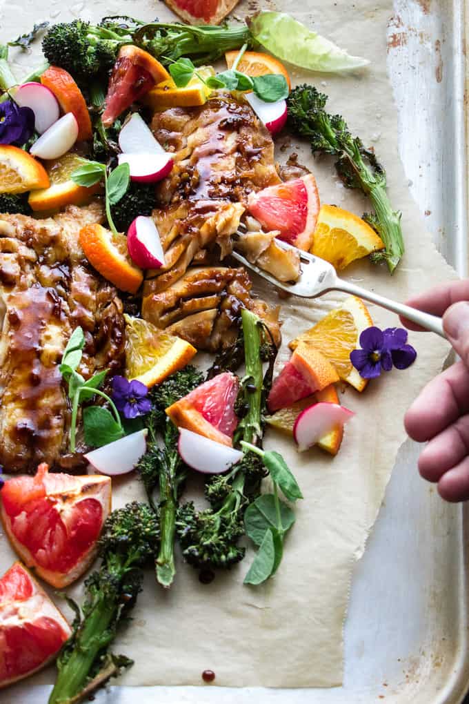 We're chasing winter blues away with bright and tangy winter citrus and Asian hoisin glaze. This citrus hoisin glazed roasted sheet pan cod is a one pan dinner takes less than 30 minutes to make.  It's completely gluten and carb free. It's perfect for cold January nights, but is completely diet friendly.