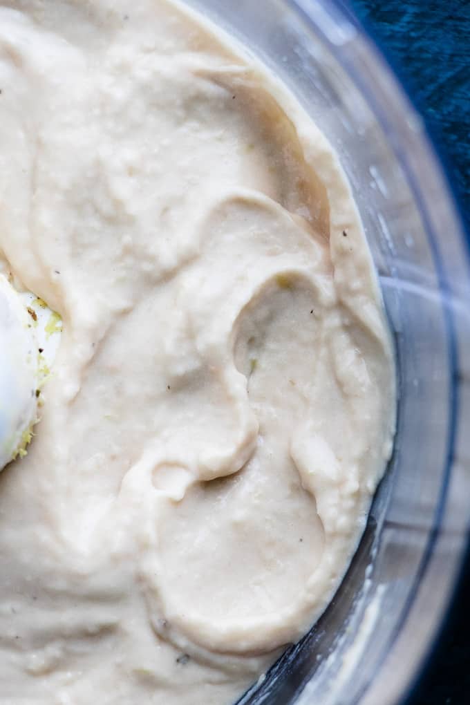 This Tuscan Roasted Garlic and White Bean Dip is the smoothest, creamiest dip for snack time. It's the best for quick healthy, high protein snacks and maybe even as part of your favourite healthy simple recipes. And it's only got 4 ingredients.