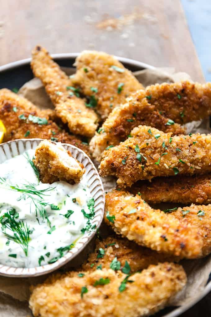 Crispy Chicken tenders in a dip.