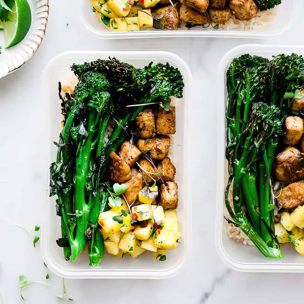 Tofu meal prep bowl with vegetables and rice.