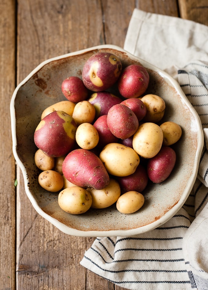 Coloured potatoes in a bowl.