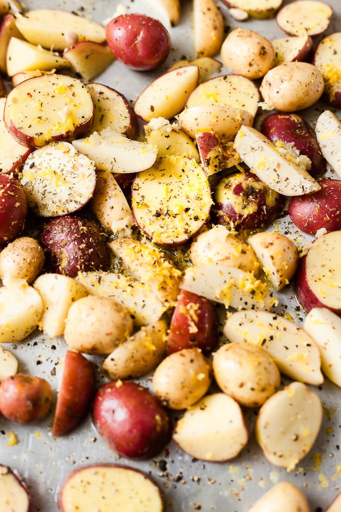 Greek roast potatoes on a tray.