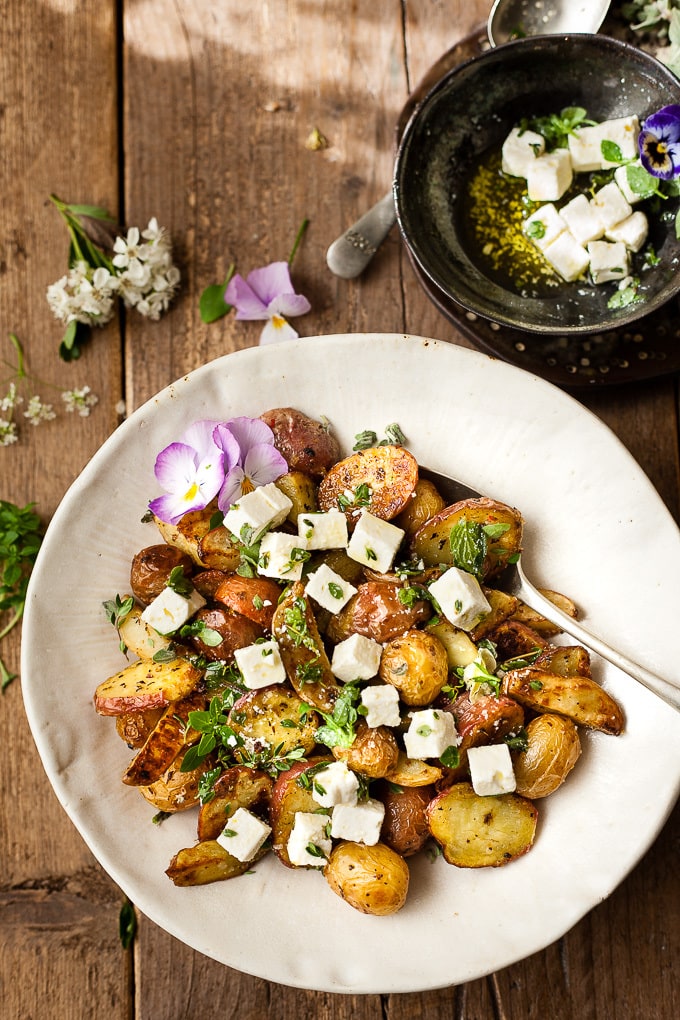 Greek Roast Potatoes with feta in a bowl