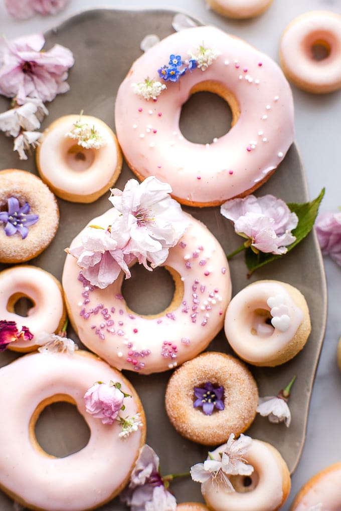 Close up of baked donuts on a plate.