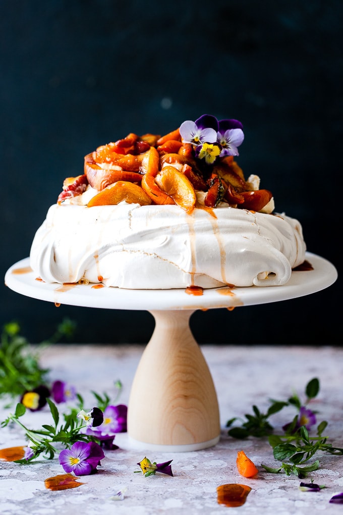 Pavlova cake with whipped cream and fruit.