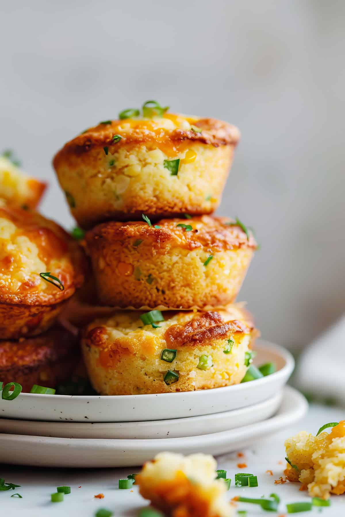 Jalepeno cheddar cornbread muffins on a plate.