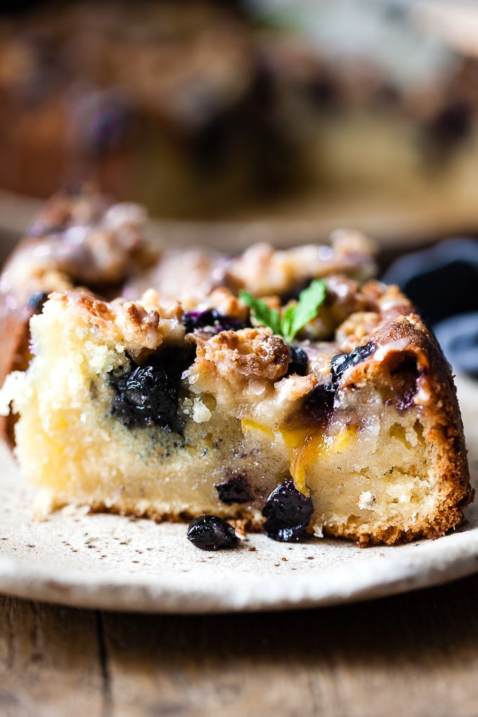 Slice of blueberry coffee cake on a plate
