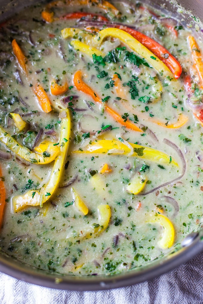 vegetarian Thai green curry in a pan with vegetables.