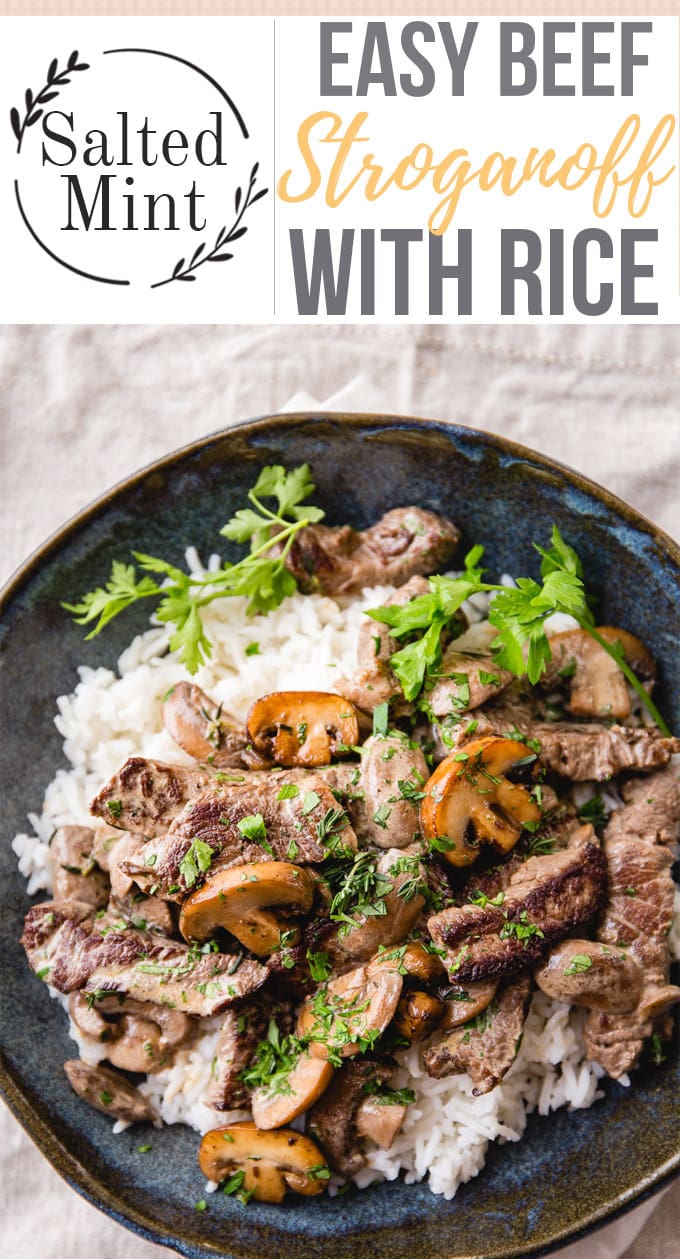 Easy beef stroganoff over rice in a blue bowl.
