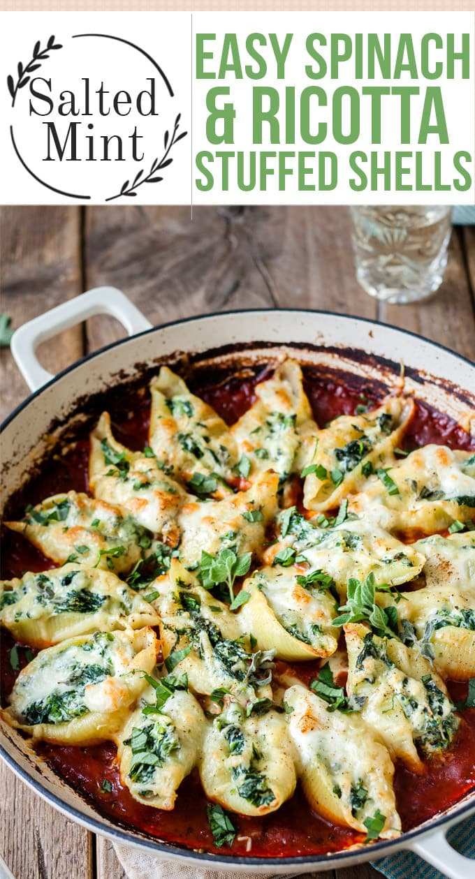 Spinach and ricotta stuffed shells with tomato sauce.