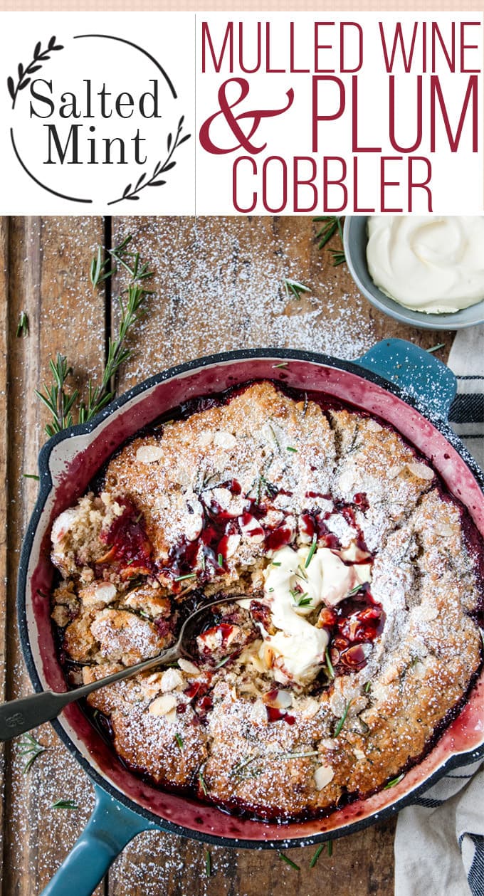 Plum Cobbler in a skillet with text overlay.