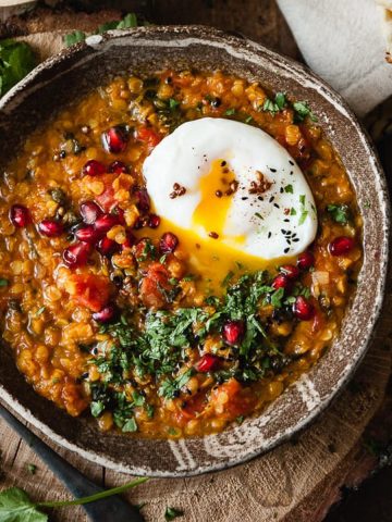 Tomato dhal with pumpkin in a bowl.