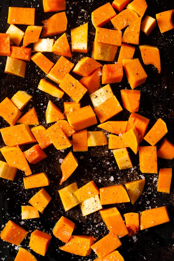 Roasted pumpkin on a baking tray.