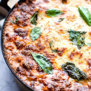 Skillet lasagna with extra cheese and basil.