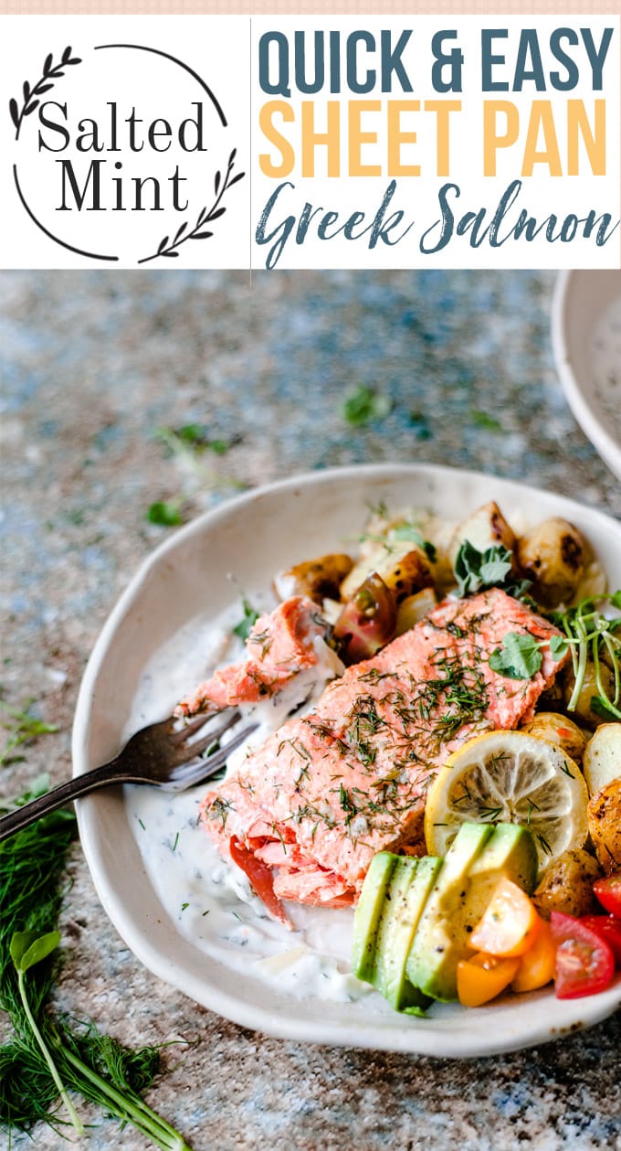 Greek salmon in a white bowl with a fork.