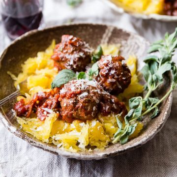 Italian Lamb Meatballs in a bowl with red wine.