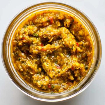 Homemade Thai yellow curry paste in a jar.