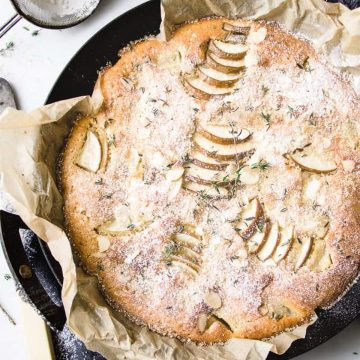 Apple and pear cake with thyme leaves.