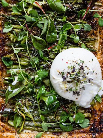 Asparagus and puff pastry tart with burrata.