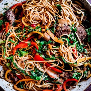 Beef noodle stir fry with bell peppers and noodles.
