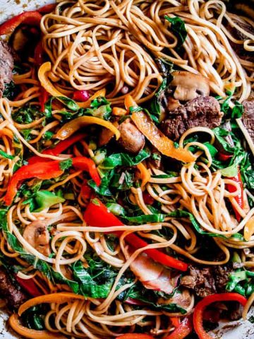 Beef noodle stir fry with bell peppers and noodles.