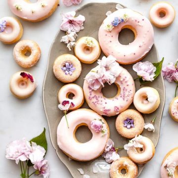 Buttermilk baked donuts with pink glaze.