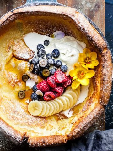 Buttermilk dutch baby with cream and fruit.