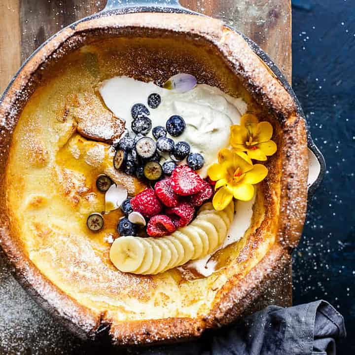 Buttermilk dutch baby with cream and fruit.