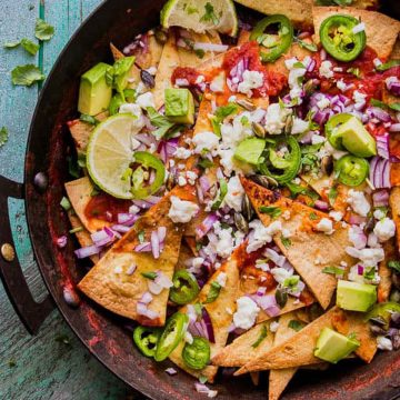 Chilaquiles with feta and avocado.