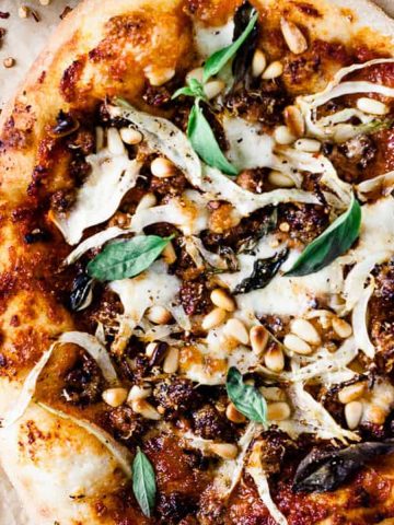 Chorizo pizza with fennel and basil.