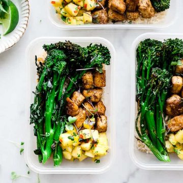 Grilled Jerk spiced tofu with pineapple salsa and broccoli.