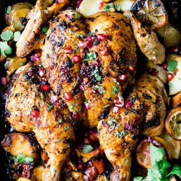 Harissa roasted chicken with potatoes and lemon.