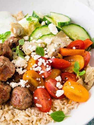 Lamb meatballs with feta cheese and rice.