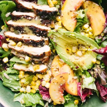 Maple grilled chicken salad with peaches and avocado.