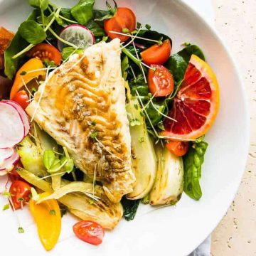 Roasted cod with fennel and tomatoes.
