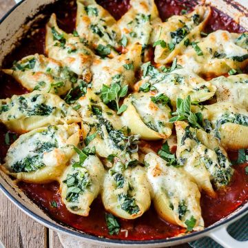 Spinach and ricotta stuffed shells in tomato sauce.